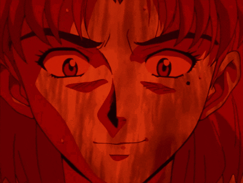 a close up of a cartoon character 's face with red hair