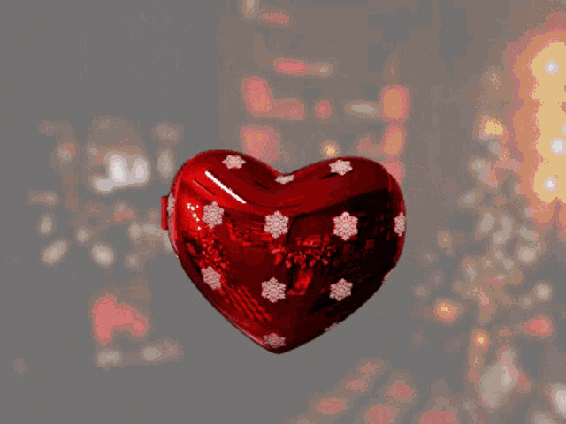a picture of a woman in a santa hat is in a heart shaped mirror that says ' slangenvrouw ' on it