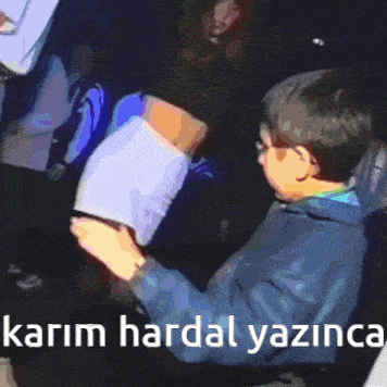 a blurry picture of a person with the words karim hardal yazinca