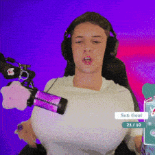 a man wearing headphones and a purple microphone has a sub goal of 21/30