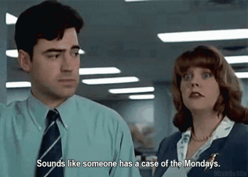 a man and a woman are standing next to each other and the woman is saying sounds like someone has a case of the mondays