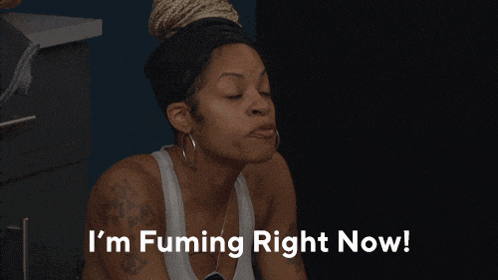 a woman says " i 'm fuming right now " in front of a black background