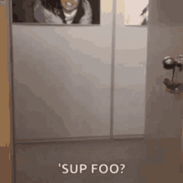 a woman is taking a picture of herself in a mirror and says ' sup foo '