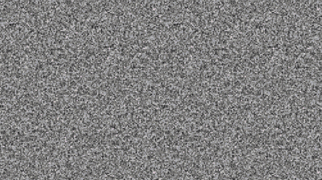 a close up of a gray background with a lot of small dots .