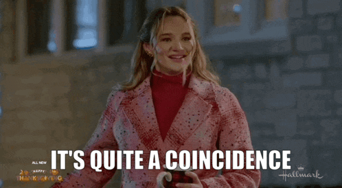 a woman in a pink coat is holding a cup of coffee and saying it 's quite a coincidence