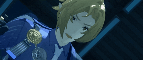 a man in a blue uniform has a medal around his neck that says ' a ' on it