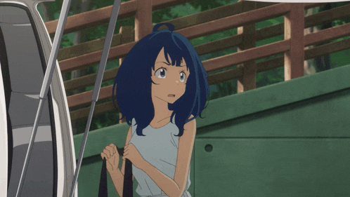 a girl with blue hair stands next to a man