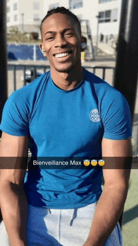 a man in a blue shirt with the words bienveillance max on the front
