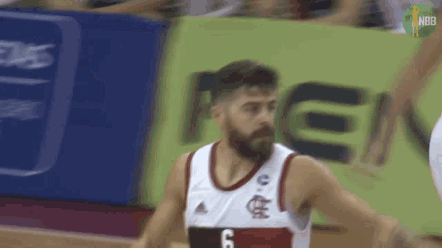 a basketball player wearing a jersey with the number 6
