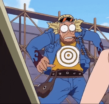a man in a blue jacket has a target on his shirt