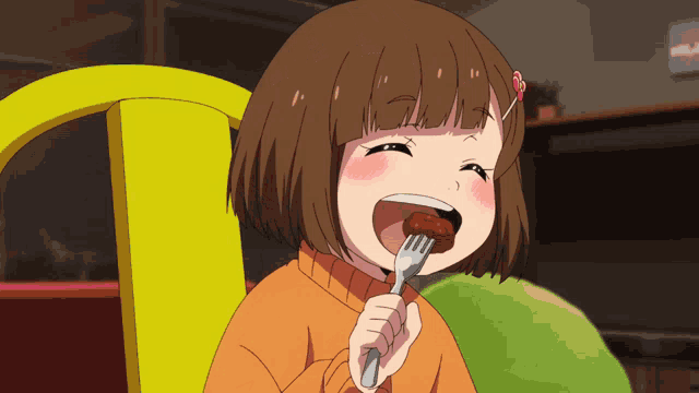 a girl with brown hair is holding a fork in her mouth and smiling