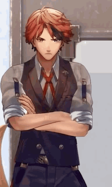 a man with red hair is standing with his arms crossed
