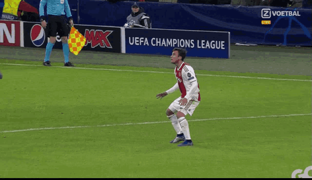 a soccer player with the number 25 on his back
