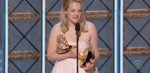 Receiving The Emmy GIF - Elizabeth Moss Handsmaids Tale Victory GIFs