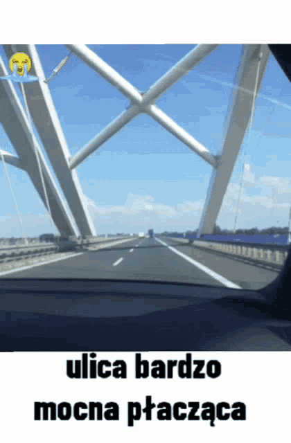 a picture of a bridge with ulica bardzo mocna ptaczaca on the bottom