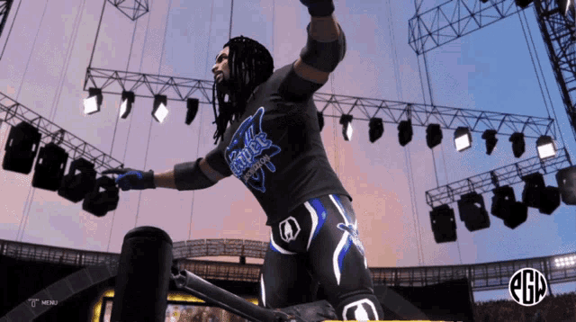 a wrestler in a black shirt that says eagle fang on it