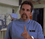 a man with a mustache and a name tag that says phil l.
