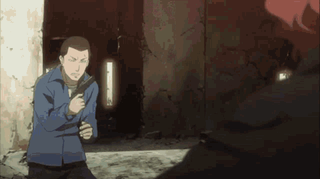 a man in a blue suit is pointing a gun at another man with red hair
