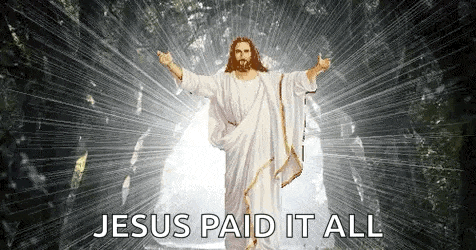 jesus is standing in front of a cave with his arms outstretched and says `` jesus paid it all '' .