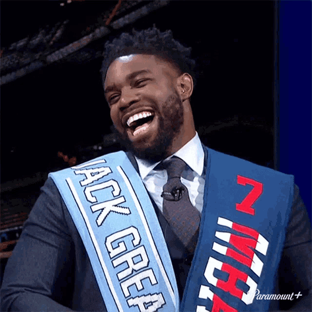 a man is wearing a sash that says jack great on it