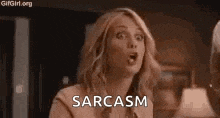 a woman is making a funny face and saying sarcasm in a room .