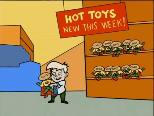 a sign that says hot toys new this week hangs over a store