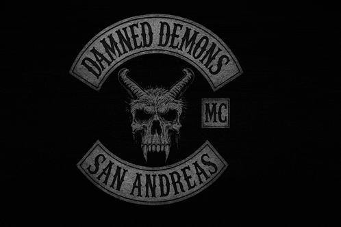 a skull with horns and the words damned demons san andreas mc