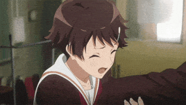 a girl in a school uniform is crying with her eyes closed and her mouth open