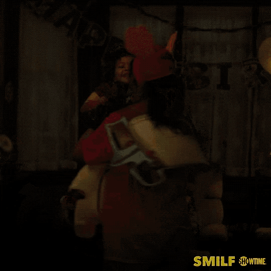 a poster for a show called smilf shows two people hugging