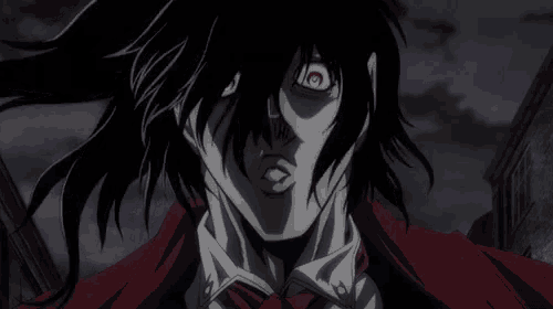 a close up of a person with red eyes and black hair