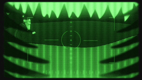 a green screen shows a shark 's teeth with a circle in the middle of it