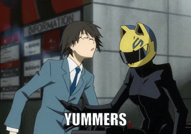 a man in a suit and tie stands next to a woman in a helmet with yummers written on the bottom