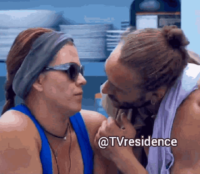 a man and a woman are looking at each other with the words @tvresidence below them