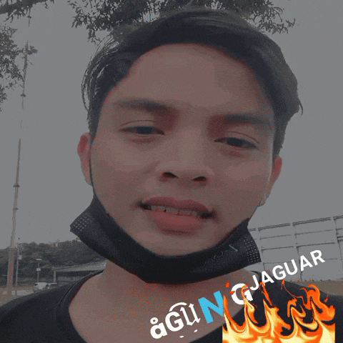 a man wearing a black mask with agin jaguar written on the bottom