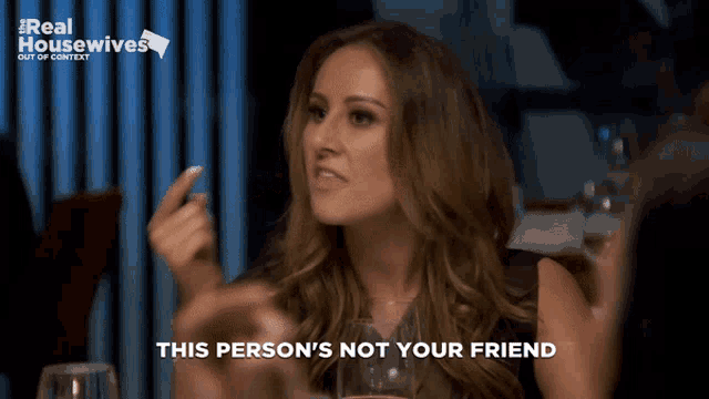 a woman says this person 's not your friend in front of a real housewives logo