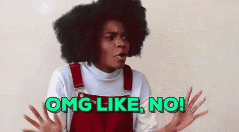 a woman with an afro is making a funny face and saying `` omg like no '' .