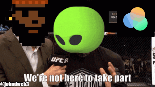 a man with a green alien head is being interviewed by ufc reporters