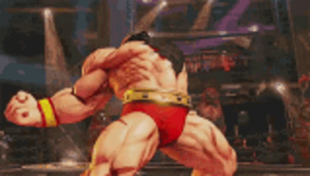 a muscular man in red underwear is standing in a ring .