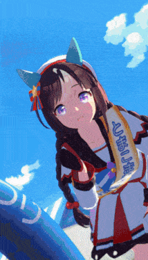 a girl with a sash around her neck that says ' a ' on it