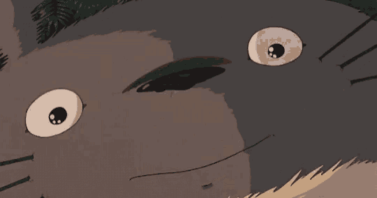 a close up of a cartoon character 's face with a big smile on it
