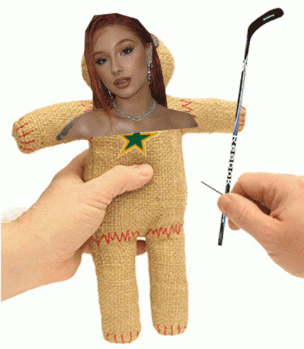 a person is holding a stuffed animal with a picture of a woman in it