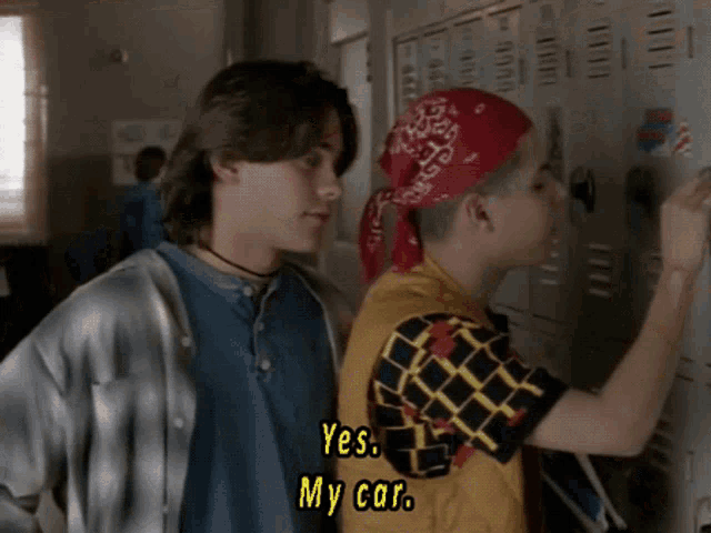 a man wearing a red bandana says " yes my car "