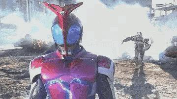 a man in a red and purple robot costume is standing in a field