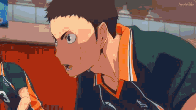 a man in a volleyball uniform with the number 3 on it