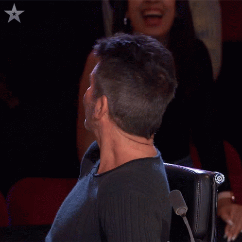 Looking Around Simon Cowell GIF - Looking Around Simon Cowell Britains Got Talent GIFs