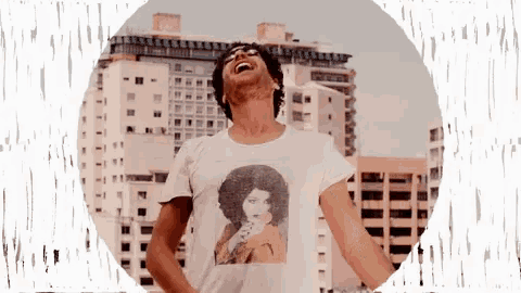 a man in a white t-shirt with a picture of a woman on it