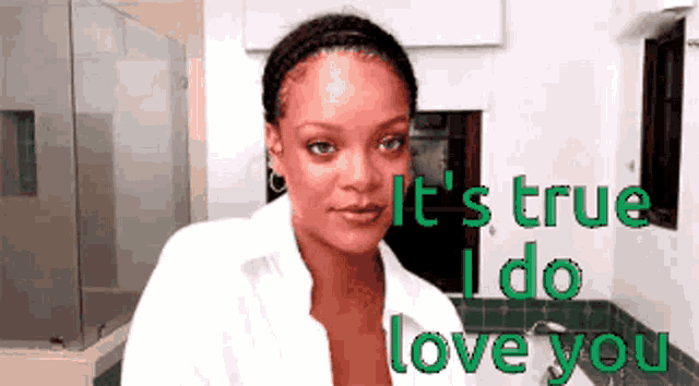 a woman in a bathroom with the words it 's true i do love you