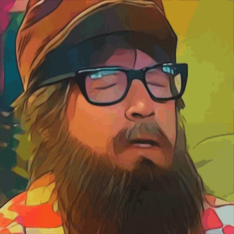 a bearded man wearing glasses and a hat with his eyes closed