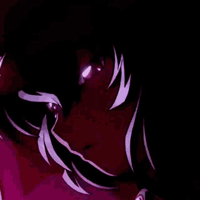 a close up of a person 's face with purple hair and a purple background .