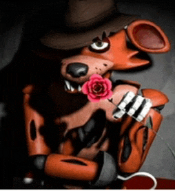 a cartoon character with a hat and a rose in its mouth